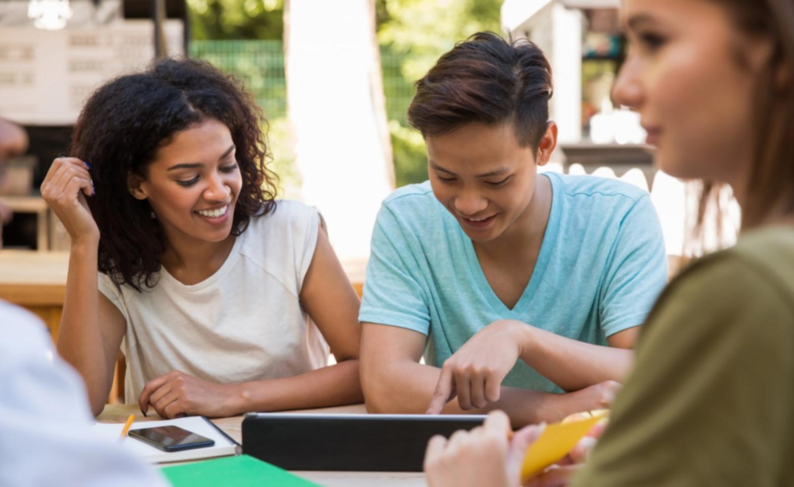 Financial planning tools and calculator on desk with investment charts